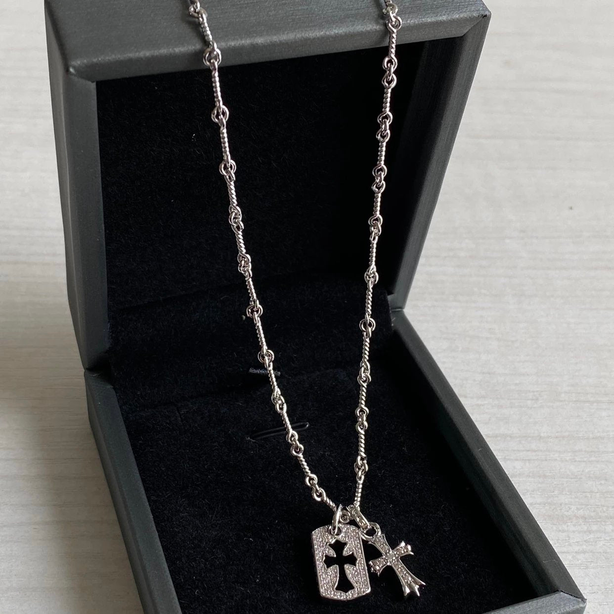 CH diamond cross necklace stacking design