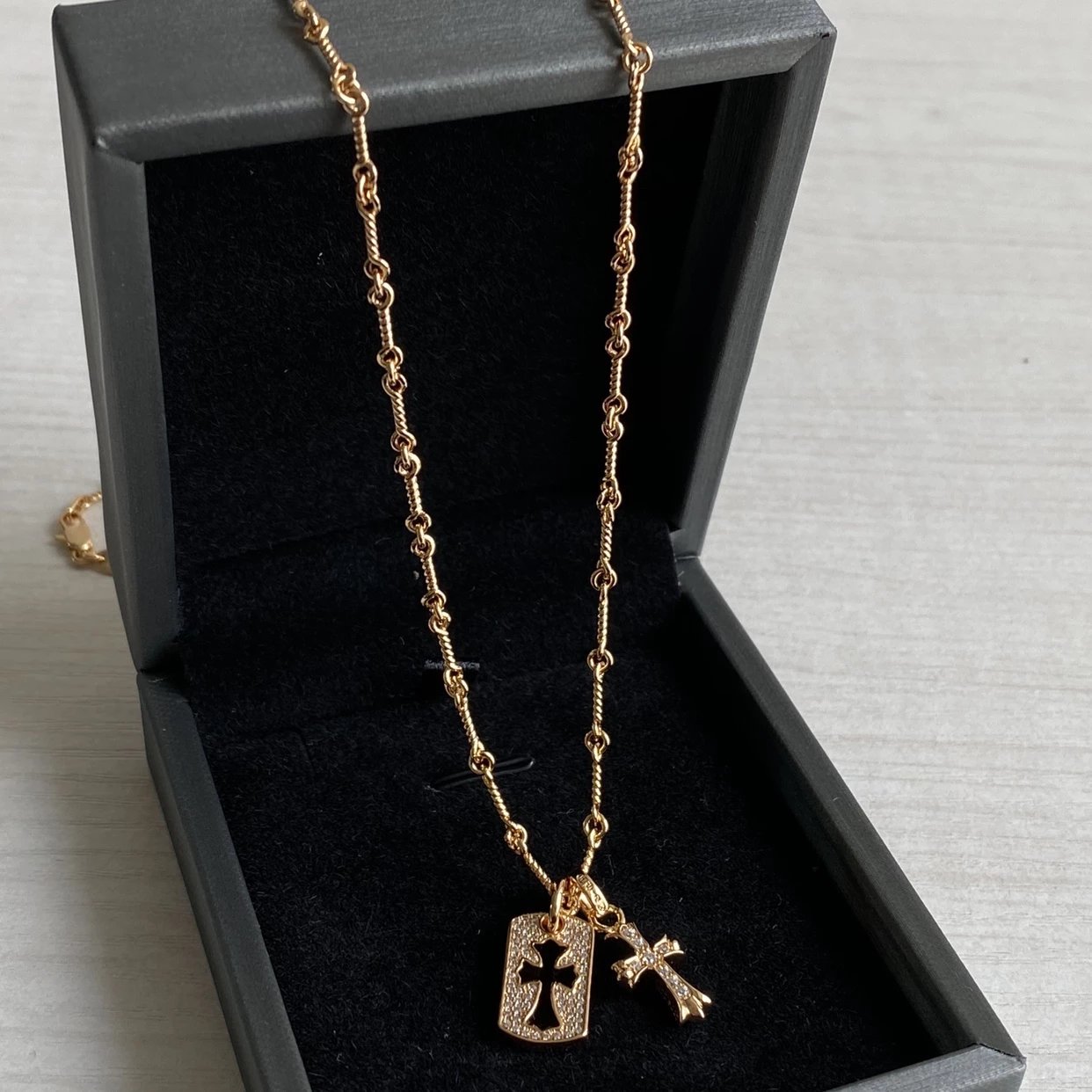 CH diamond cross necklace stacking design