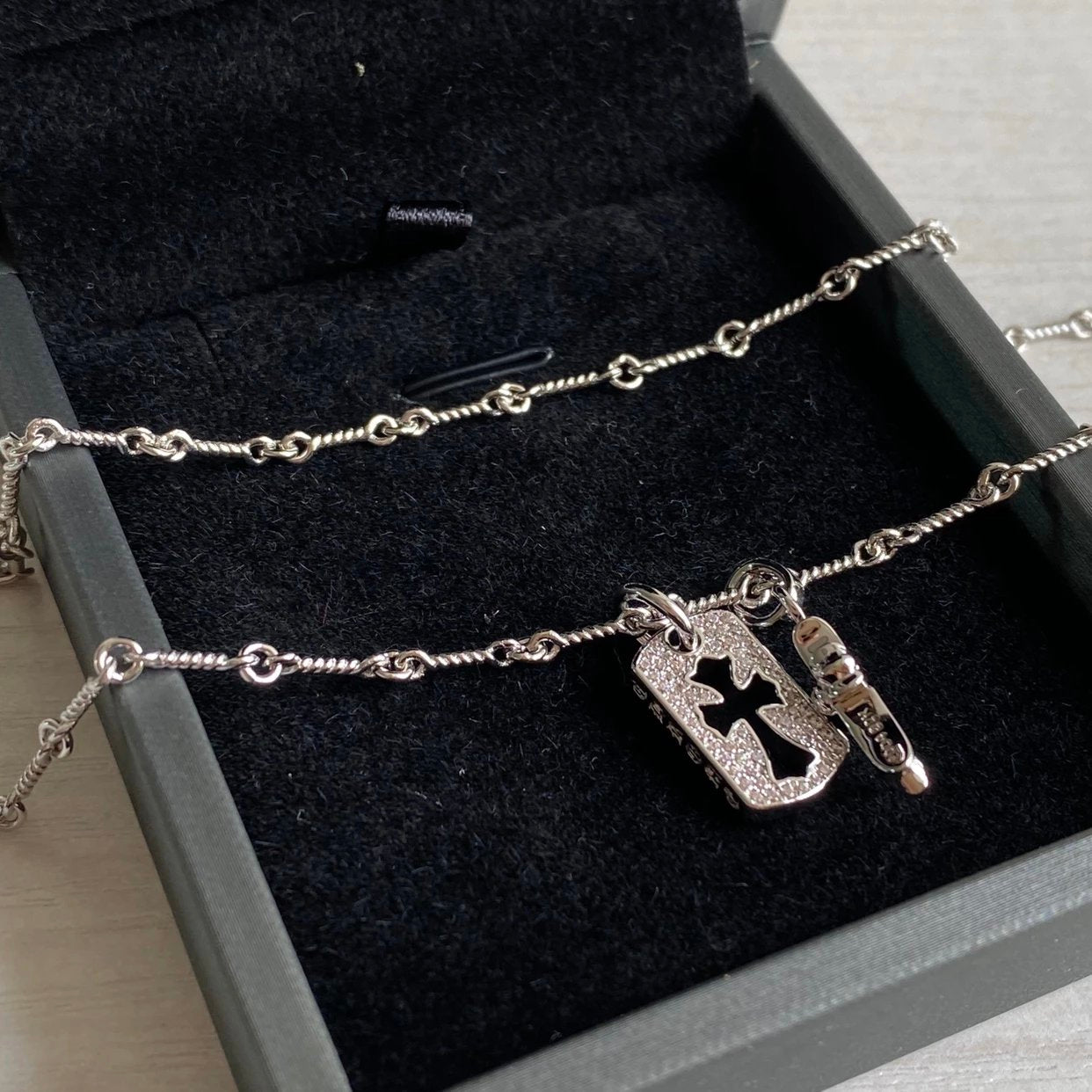 CH diamond cross necklace stacking design