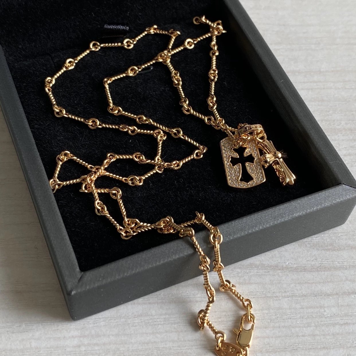 CH diamond cross necklace stacking design
