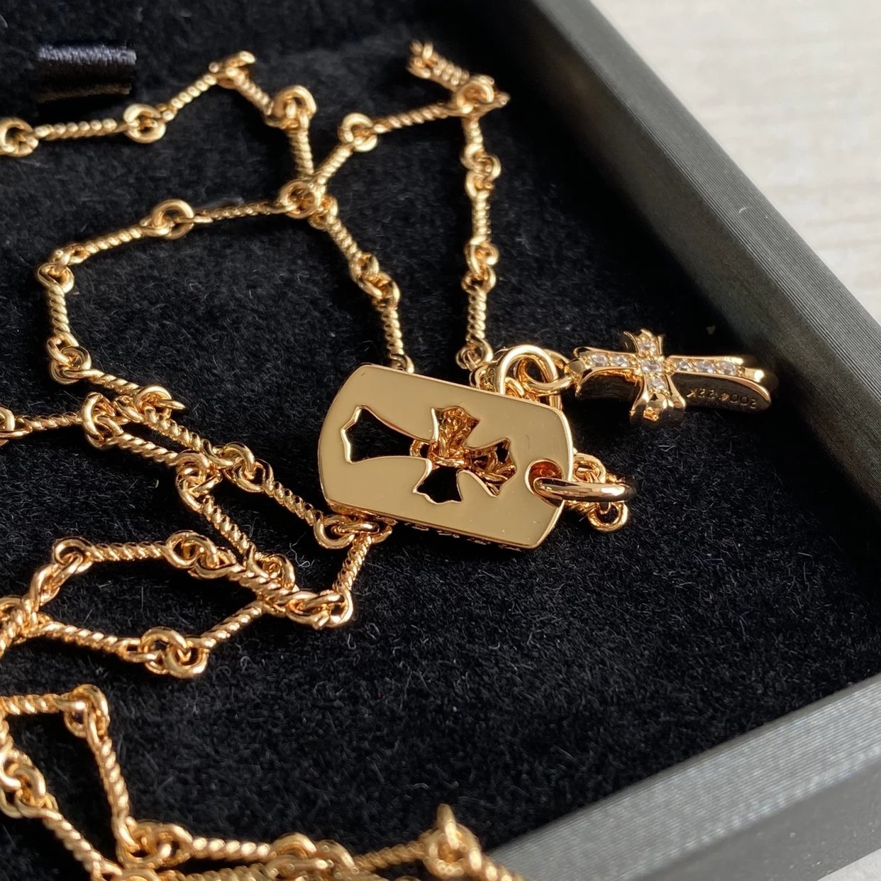 CH diamond cross necklace stacking design