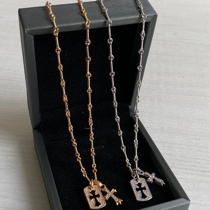 CH diamond cross necklace stacking design