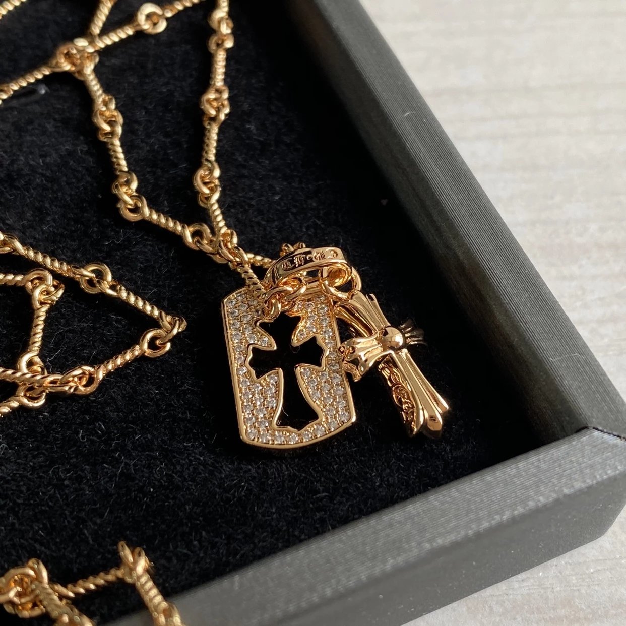 CH diamond cross necklace stacking design